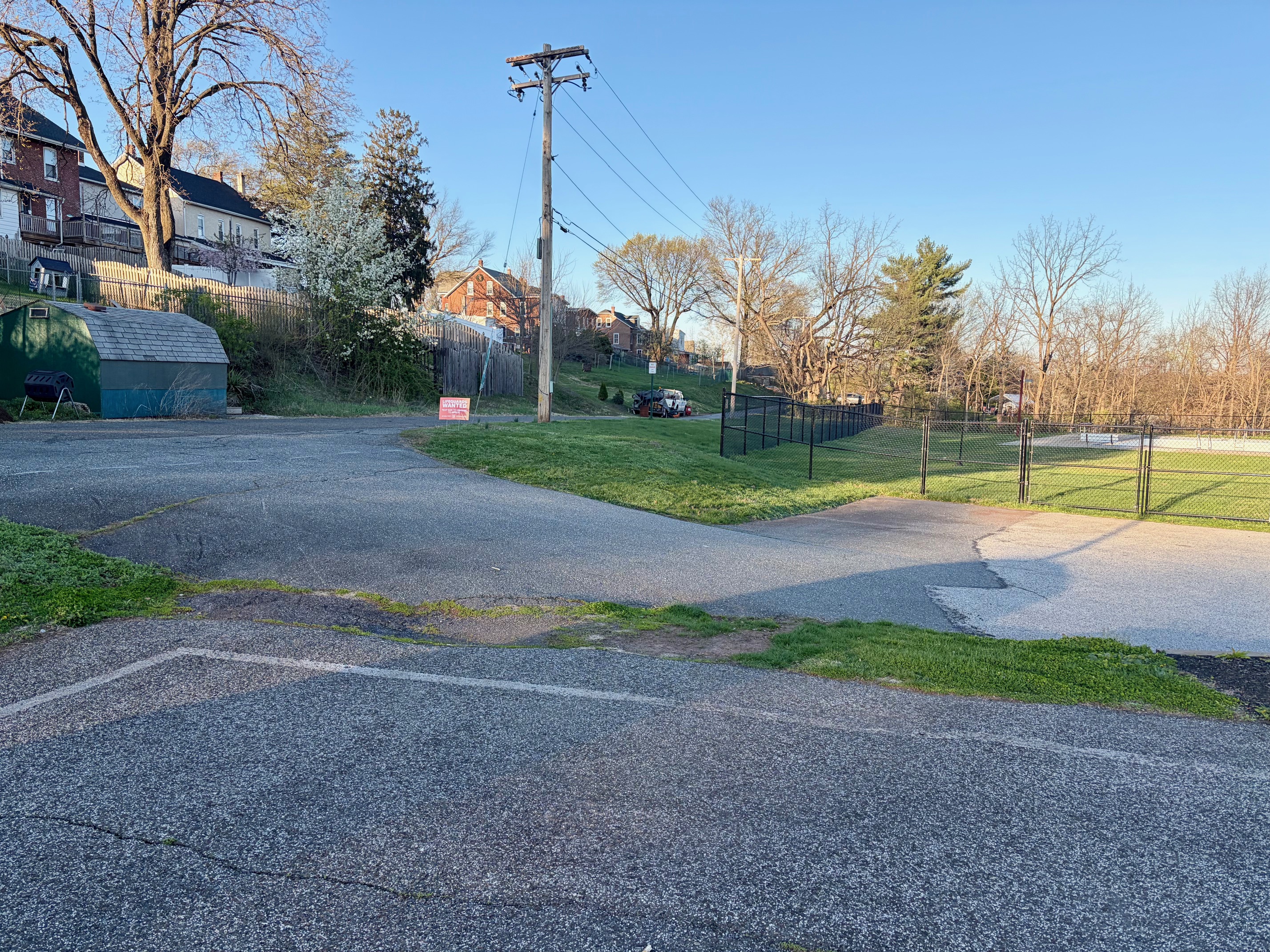 A makeshift connection between the pool area driveway and the parking lot will be closed off.