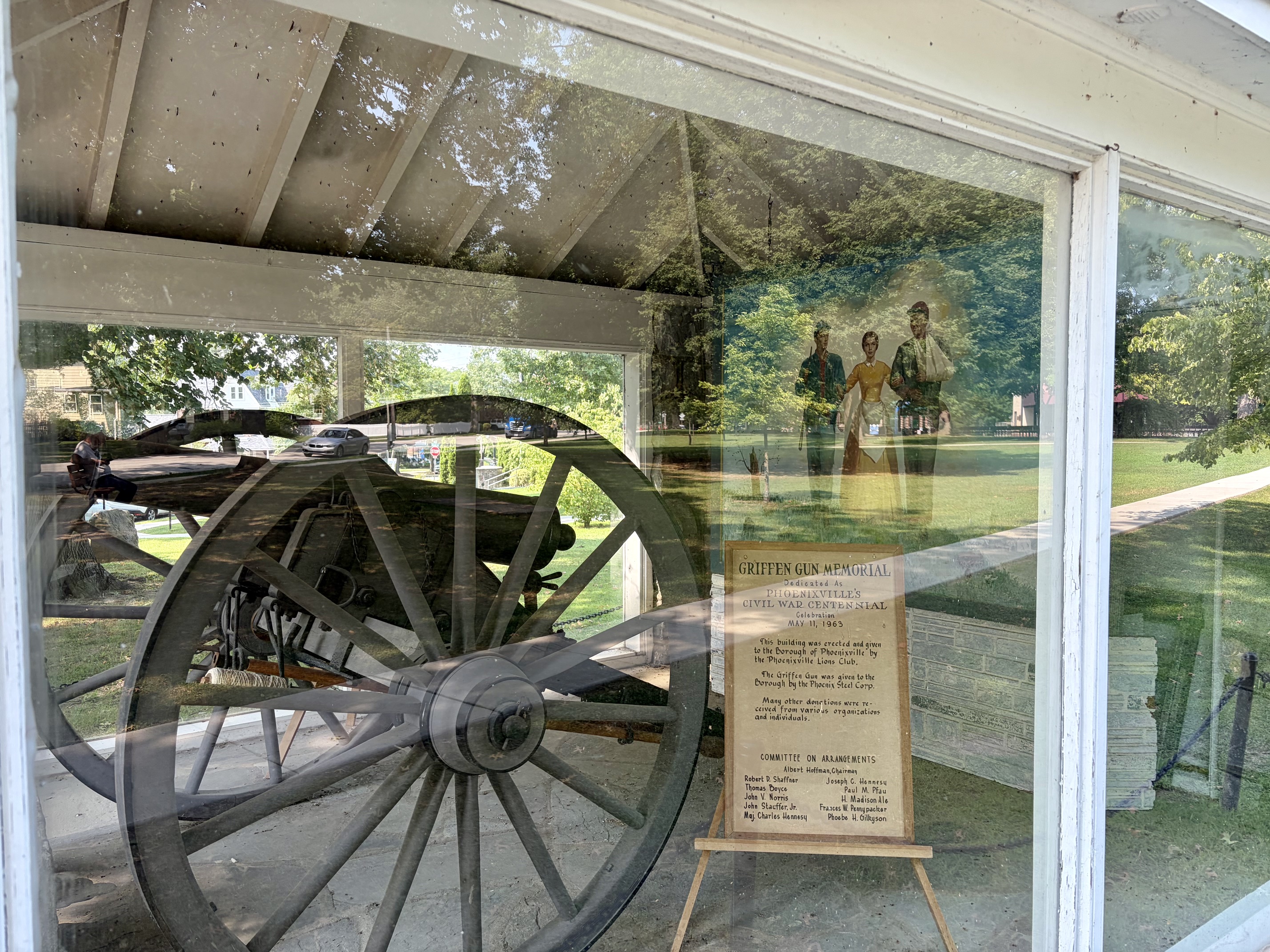 Joseph Hennesy's painting is located inside the glass-enclosed memorial.